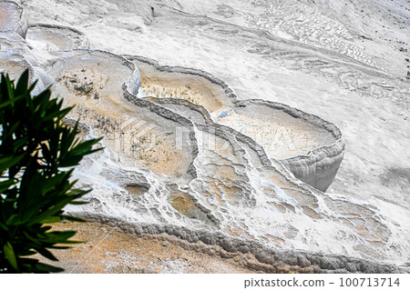 View of dry traventines in Pamukkale on a sunny summer day. View from the top. Turkey 100713714