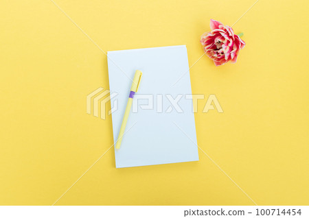 Creative flat photography desktop. Top view yellow desk with blank notebooks mockup with pencil 100714454