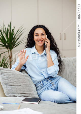 Pleasant telephone conversation in a homely atmosphere. Pleasant telephone conversation in a homely atmosphere. 100714645