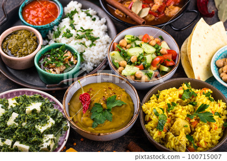 Assorted of traditional Indian food. 100715007
