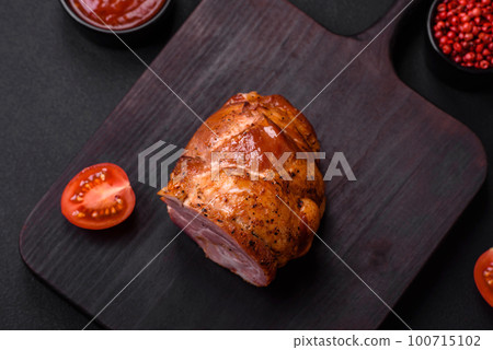 Delicious fresh baked meat roll with spices and herbs 100715102
