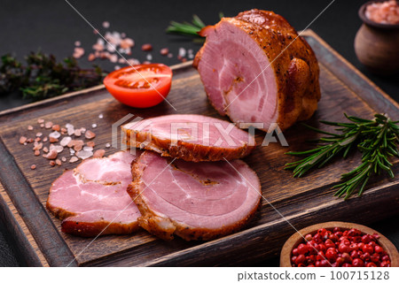 Delicious fresh baked meat roll with spices and herbs Delicious fresh baked meat roll with spices and herbs 100715128