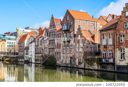 The river and medieval houses of Ghent, a city in the Flemish region of Belgium. Travel concept 100722050