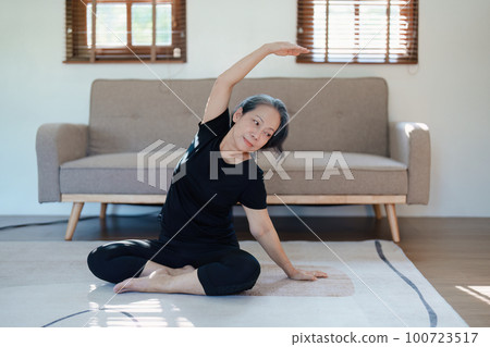 stress relief, muscle relaxation, breathing exercises, exercise, meditation, portrait of Young Asian woman relaxing her body from by practicing yoga 100723517