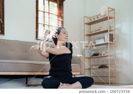 stress relief, muscle relaxation, breathing exercises, exercise, meditation, portrait of Young Asian woman relaxing her body from by practicing yoga 100723556