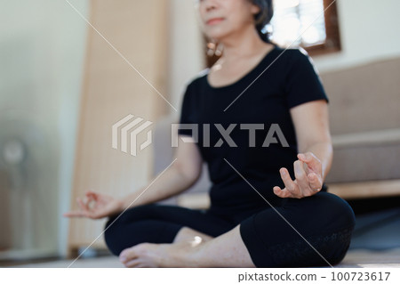 stress relief, muscle relaxation, breathing exercises, exercise, meditation, portrait of Young Asian woman relaxing her body from by practicing yoga stress relief, muscle relaxation, breathing exercises, exercise, meditation, portrait of Young Asian woman relaxing her body from by practicing yoga 100723617
