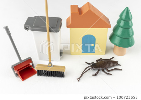 Toy cockroaches, cleaning tools and a house. image of pest control Toy cockroaches, cleaning tools and a house. image of pest control 100723655