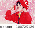 Children and cherry blossom storm 100725129