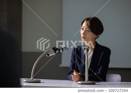 press conference woman press conference woman 100727204