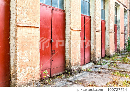 Three old iron red door 100727734
