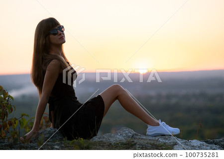 A little girl in a short summer dress. Stock Photo