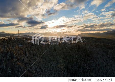 Winter landscape with spruse trees of snow covered forest in cold mountains. Winter landscape with spruse trees of snow covered forest in cold mountains. 100735461
