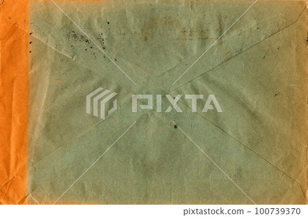 Back of an old used envelope. Rich stain and paper details. Can be used as background Back of an old used envelope. Rich stain and paper details. Can be used as background 100739370