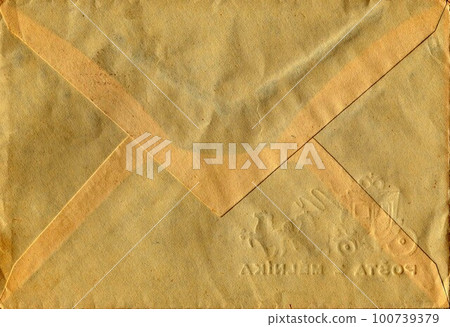Back of an old used envelope. Rich stain and paper details. Can be used as background Back of an old used envelope. Rich stain and paper details. Can be used as background 100739379