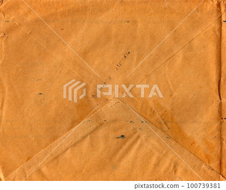 Back of an old used envelope. Rich stain and paper details. Can be used as background Back of an old used envelope. Rich stain and paper details. Can be used as background 100739381