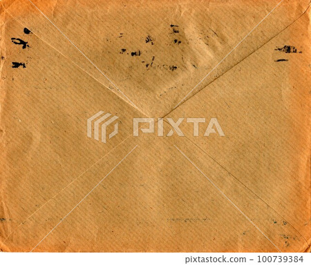 Back of an old used envelope. Rich stain and paper details. Can be used as background Back of an old used envelope. Rich stain and paper details. Can be used as background 100739384