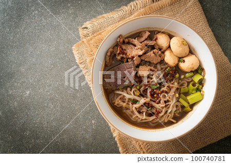 Thai noodle with pork, stewed pork, meatball and pork liver in blood soup 100740781