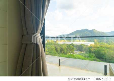 curtain with window and sunlight curtain with window and sunlight 100740808