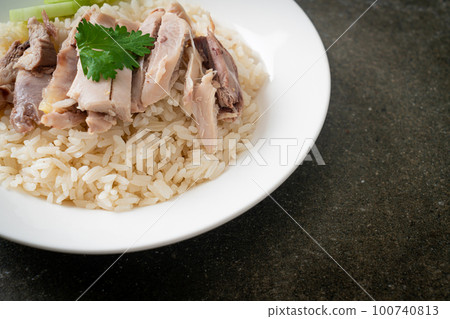 Hainanese Chicken Rice or steamed rice with chicken Hainanese Chicken Rice or steamed rice with chicken 100740813