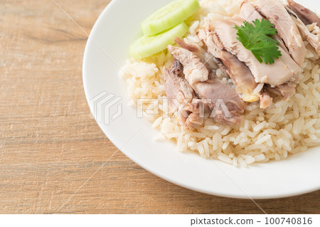 Hainanese Chicken Rice or steamed rice with chicken Hainanese Chicken Rice or steamed rice with chicken 100740816