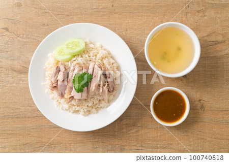 Hainanese Chicken Rice or steamed rice with chicken Hainanese Chicken Rice or steamed rice with chicken 100740818