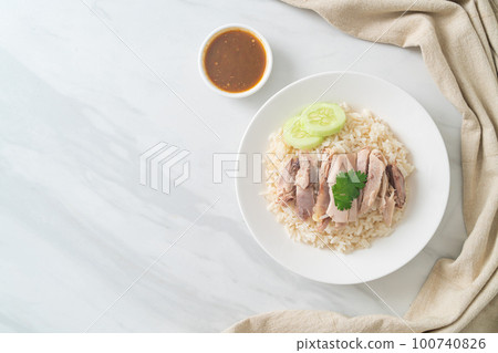 Hainanese Chicken Rice or steamed rice with chicken Hainanese Chicken Rice or steamed rice with chicken 100740826