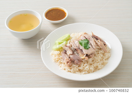Hainanese Chicken Rice or steamed rice with chicken Hainanese Chicken Rice or steamed rice with chicken 100740832