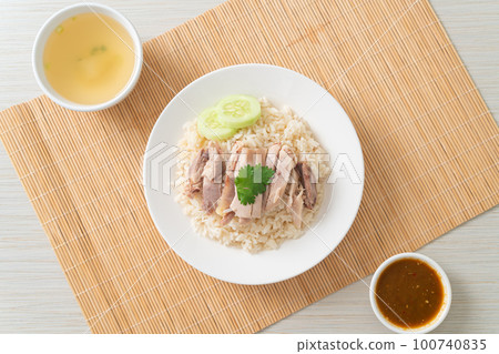 Hainanese Chicken Rice or steamed rice with chicken Hainanese Chicken Rice or steamed rice with chicken 100740835