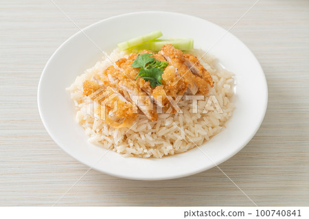 Steamed Rice with Fried Chicken or Hainanese Chicken Rice 100740841
