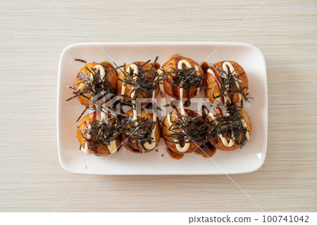 Takoyaki ball dumplings or Octopus balls Takoyaki ball dumplings or Octopus balls 100741042