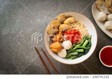 egg noodles with fish balls and shrimp balls in pink sauce, Yen Ta Four or Yen Ta Fo egg noodles with fish balls and shrimp balls in pink sauce, Yen Ta Four or Yen Ta Fo 100741191