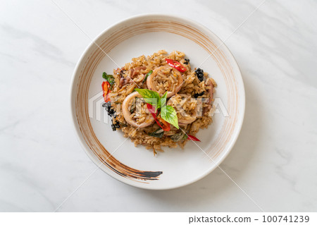 Basil and Spicy Herb Fried Rice with Squid or Octopus Basil and Spicy Herb Fried Rice with Squid or Octopus 100741239