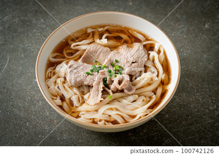 homemade udon noodles with pork in soy or shoyu soup homemade udon noodles with pork in soy or shoyu soup 100742126