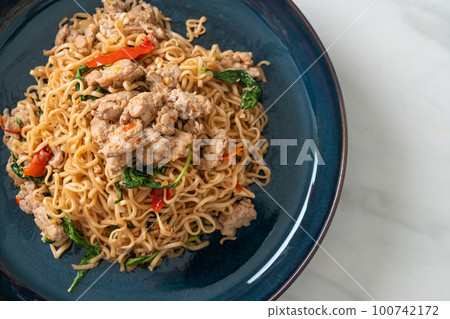 stir-fried instant noodles with basil and minced pork stir-fried instant noodles with basil and minced pork 100742172