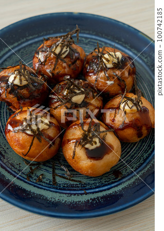 Takoyaki ball dumplings or Octopus balls 100742185