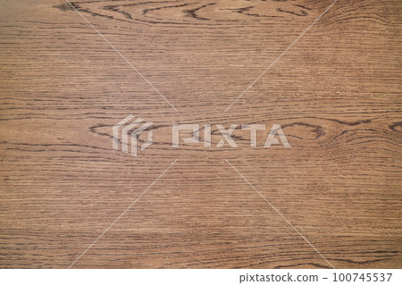 Toned oak texture as background. Wooden table top made of toned oak veneer closeup Toned oak texture as background. Wooden table top made of toned oak veneer closeup 100745537