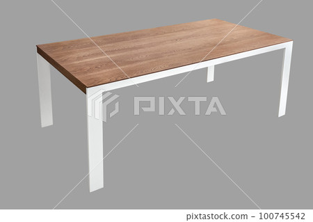 Minimalism style dining table with thin wooden table top of toned oak veneer on white metal legs isolated on gray background 100745542