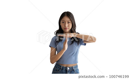 Woman makes a T hand sign indicating a request for a time-out or a temporary break, Made a serious tired face and asked to rest for a moment, Make a t-shaped symbol to show halftime and break time. Woman makes a T hand sign indicating a request for a time-out or a temporary break, Made a serious tired face and asked to rest for a moment, Make a t-shaped symbol to show halftime and break time. 100746199