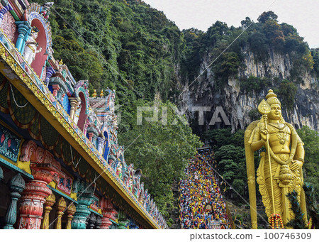 Golden Statue view during Thaipusam with temple architecture Golden Statue view during Thaipusam with temple architecture 100746309