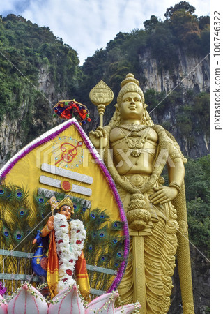 Lord Murugan statue with colorful kavadi in Thaipusam 100746322