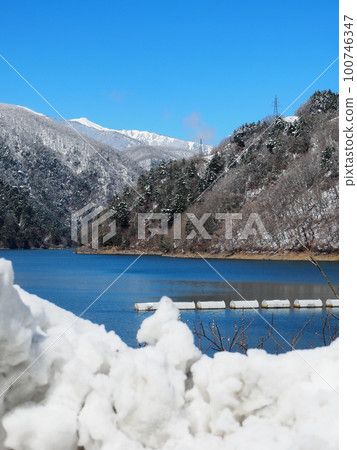 Lake Azusa with remaining snow 100746347