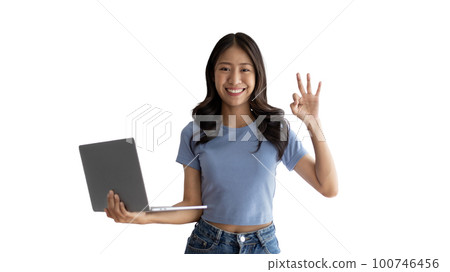 Asian woman in casual clothes holding working laptop in freelance work concept with single laptop can earn money, Invitation to apply or register to receive special privileges and prizes. 100746456