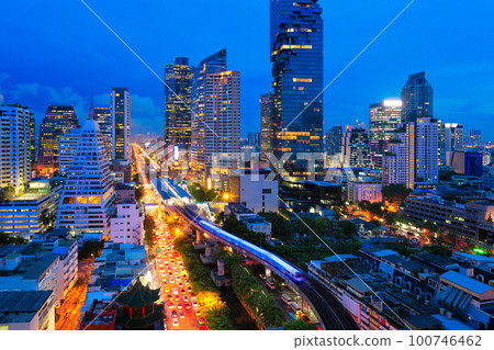 The Bangkok Skytrain passes through Chong Non Si Station a modern office building in Bangkok's downtown area at Thailand 100746462