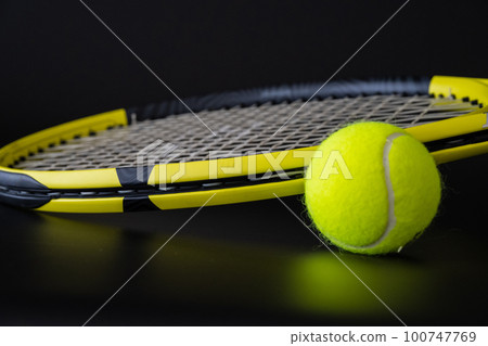 Tennis ball racket close-up sports image material Tennis ball racket close-up sports image material 100747769