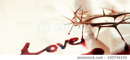 A crown of thorns symbolizing the sacrifice and suffering of Jesus Christ, the cross, love and blood, and the lettering LOVE, Passion Week and Lent Easter concept A crown of thorns symbolizing the sacrifice and suffering of Jesus Christ, the cross, love and blood, and the lettering LOVE, Passion Week and Lent Easter concept 100748330