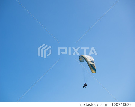 Paraglider on the blue sky in Taiwan. Paraglider on the blue sky in Taiwan. 100748622