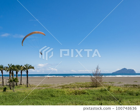 Paraglider on the blue sky in Taiwan. Paraglider on the blue sky in Taiwan. 100748636