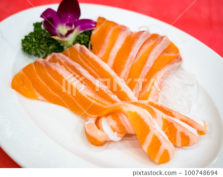 salmon sashimi raw fish of Japanese food 100748694