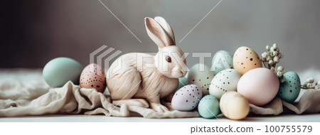 Easter composition. Easter eggs and rabbit on the table. 100755579