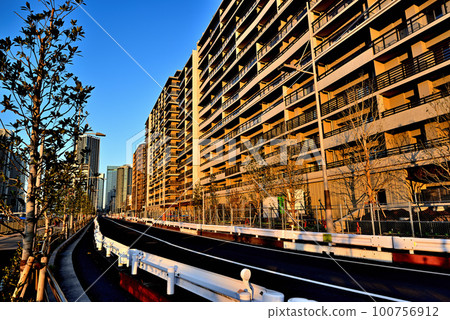 Harumi Flag and Harumi Green Road Park under construction in Tokyo Evening view of high-rise apartments Harumi Flag and Harumi Green Road Park under construction in Tokyo Evening view of high-rise apartments 100756912
